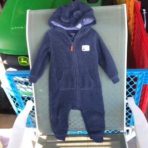 12 month Blue 1-piece bodysuit, soft zip-up front.